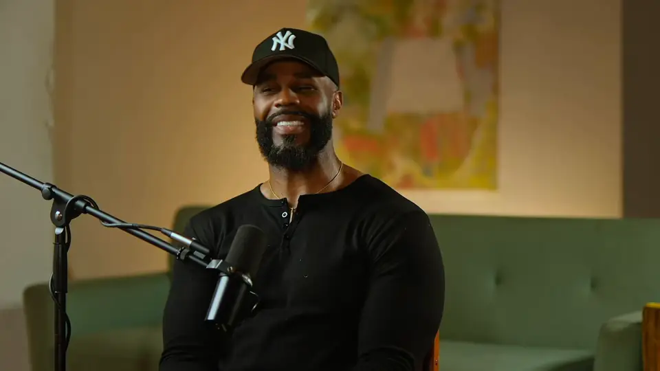 Ezekiel at the microphone in the We Need to Talk studio